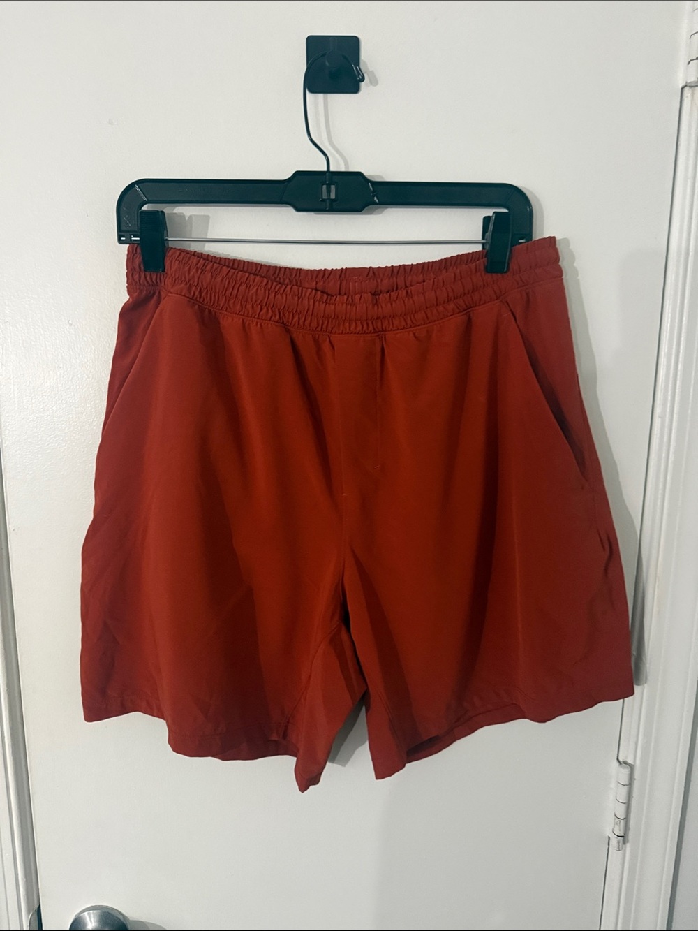 Lululemon Men's Pace Breaker Linerless Rust Red Athletic Shorts 7 in